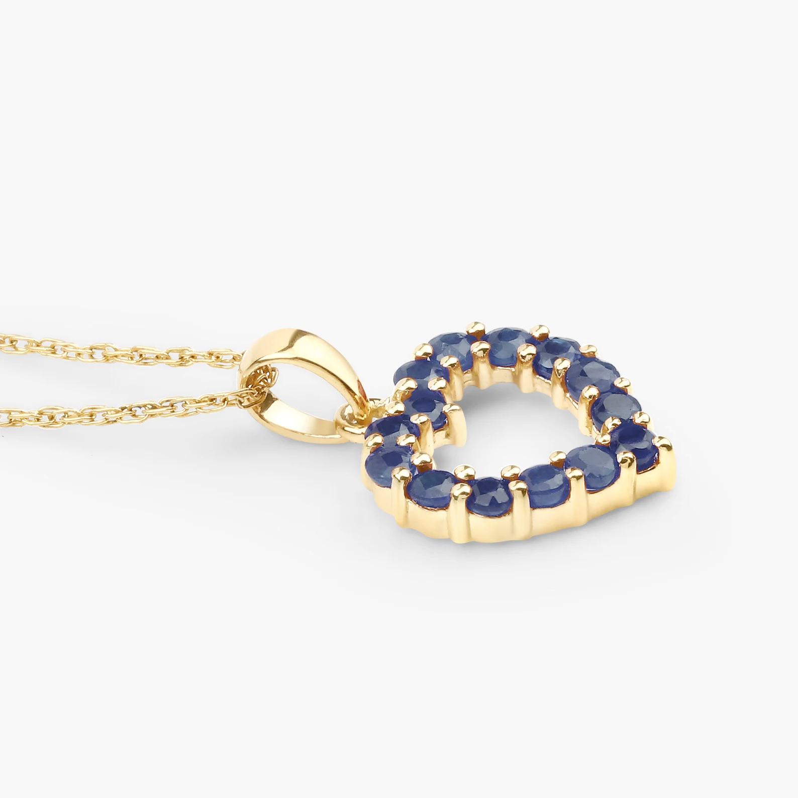 Heart Shaped Pendant and Chain in 10K Yellow Gold with Blue Sapphire 