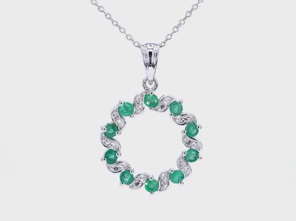 Round 10 Emerald and 20 White Topaz Stones Pendant in Rhodium Plated .925 Sterling Silver